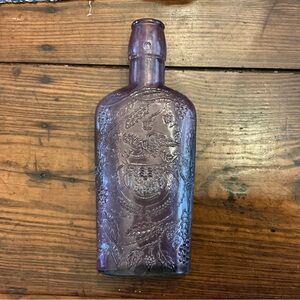 Vintage Purple Embossed Glass Bottle